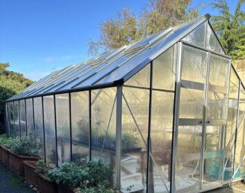 Wheelchair accessible greenhouse for year-round gardening